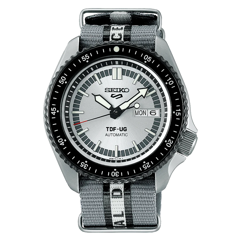 Seiko 5 Sports ULTRASEVEN Limited Edition SRPJ79K1 – Silver dial automatic watch with red accents and nylon strap.