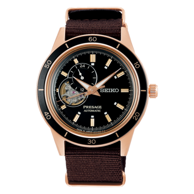 Seiko Presage SSA426J1 – Black dial automatic watch with brown nylon strap and open-heart display.
